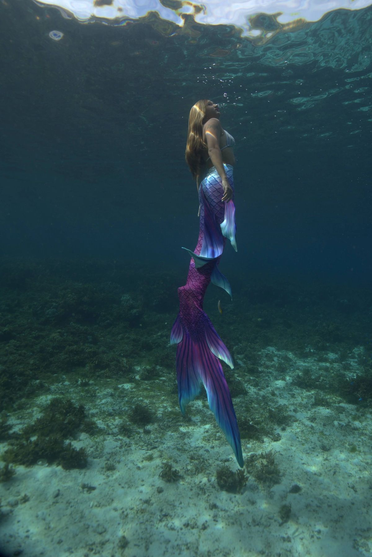 Underwater mermaid pose